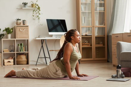 woman doing pelvic floor exercises to help strengthen her bladder